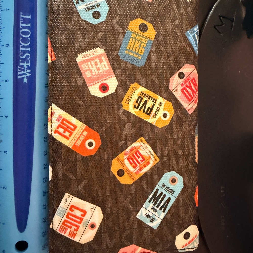 Michael Kors Travel Wallet Case with Multicolor Luggage Tag Print - Picture 9 of 10